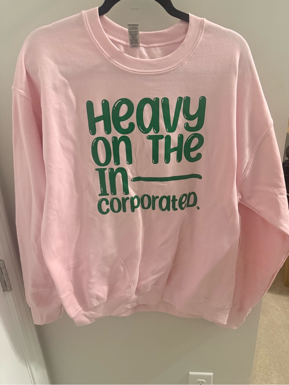 Pink Crewneck Sweatshirt with Green Graphic Text